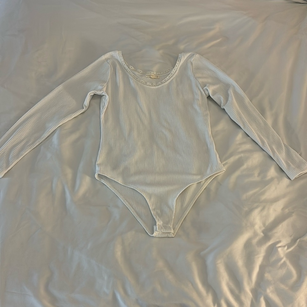 Copper key white body suit
